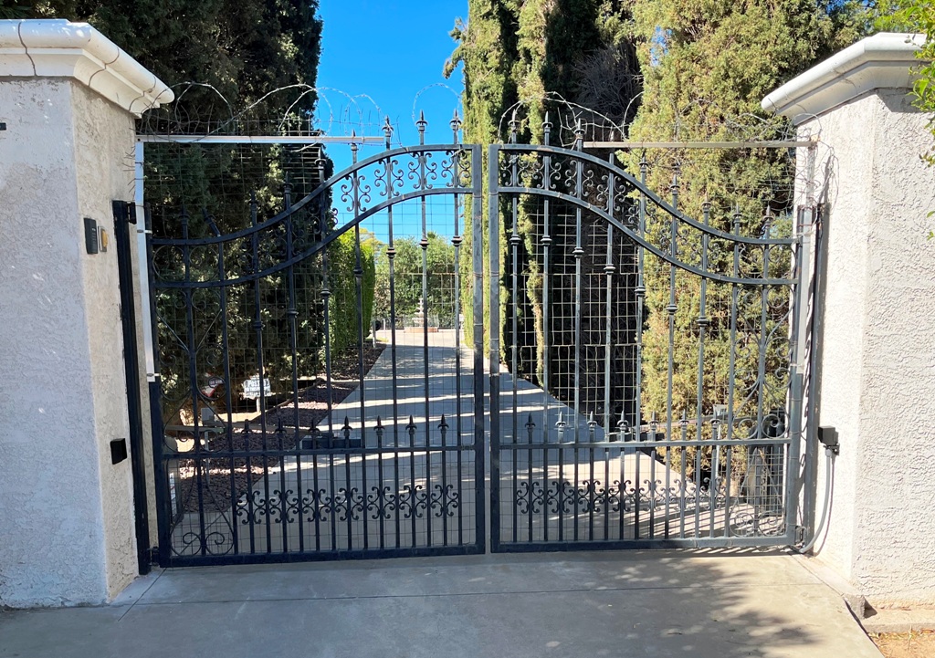 Custom driveway swing gate with LiftMaster operators